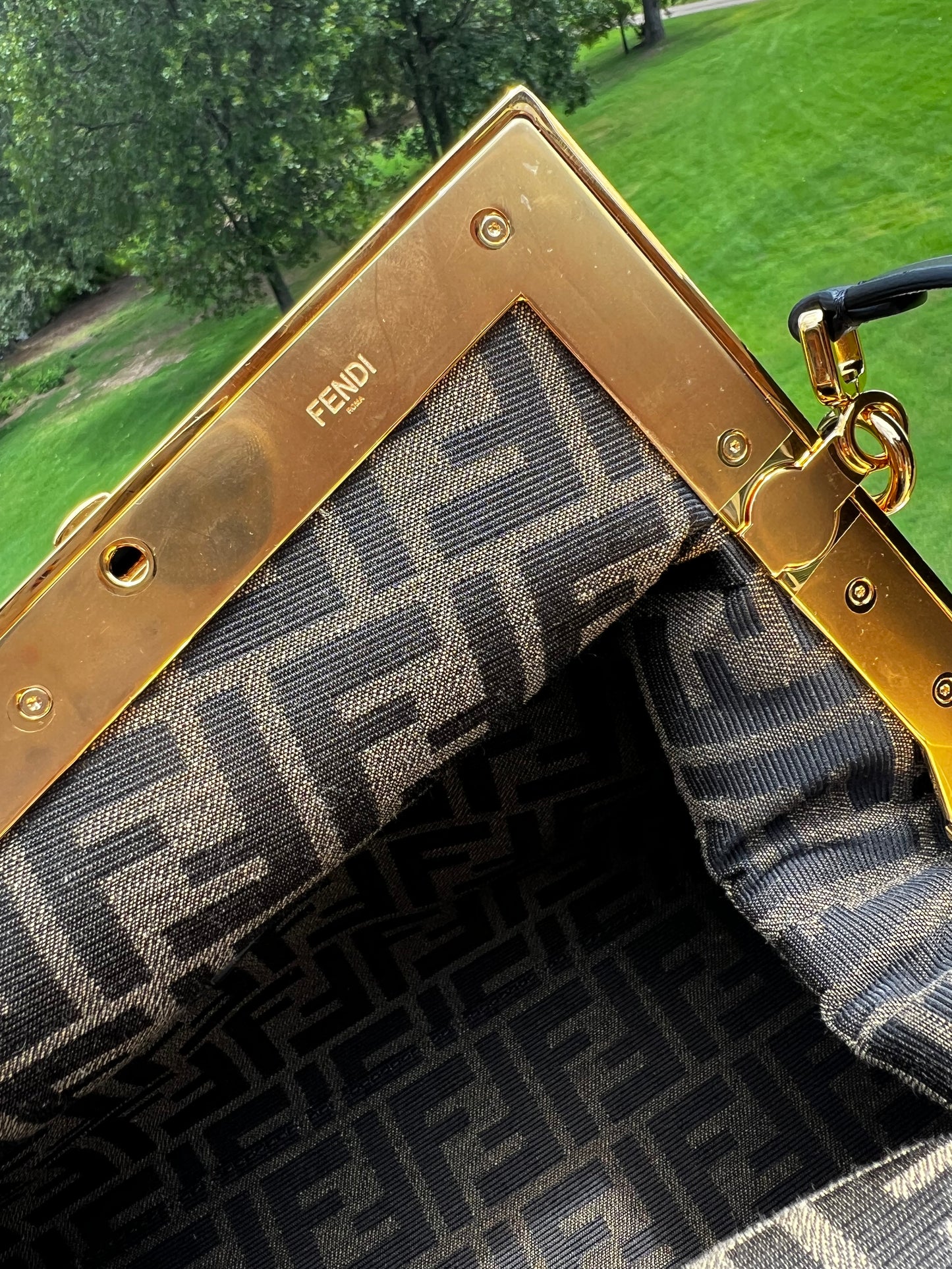 Fendi First Small Bag – Black Nappa Leather with Oversized F Clasp