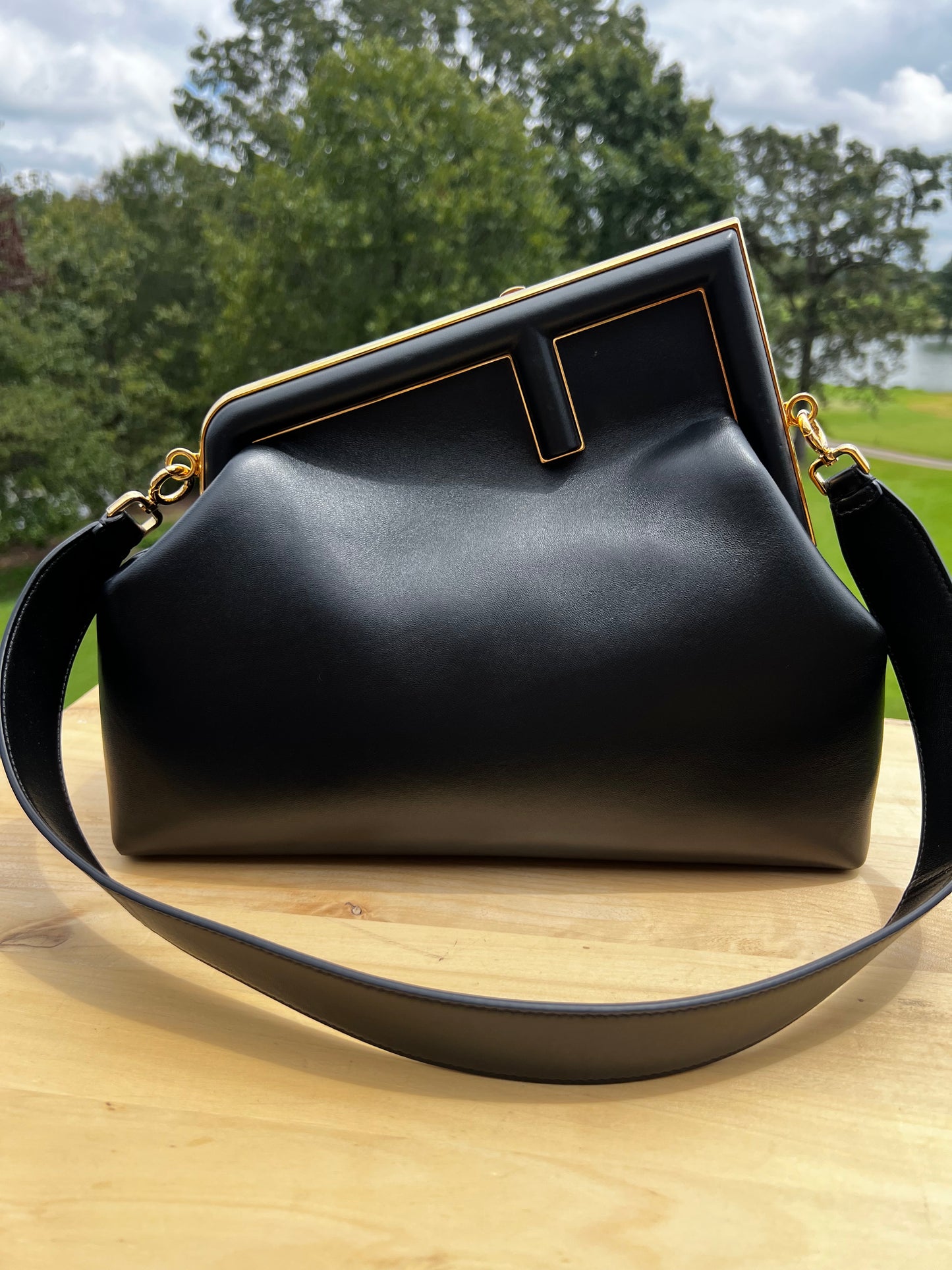 Fendi First Small Bag – Black Nappa Leather with Oversized F Clasp