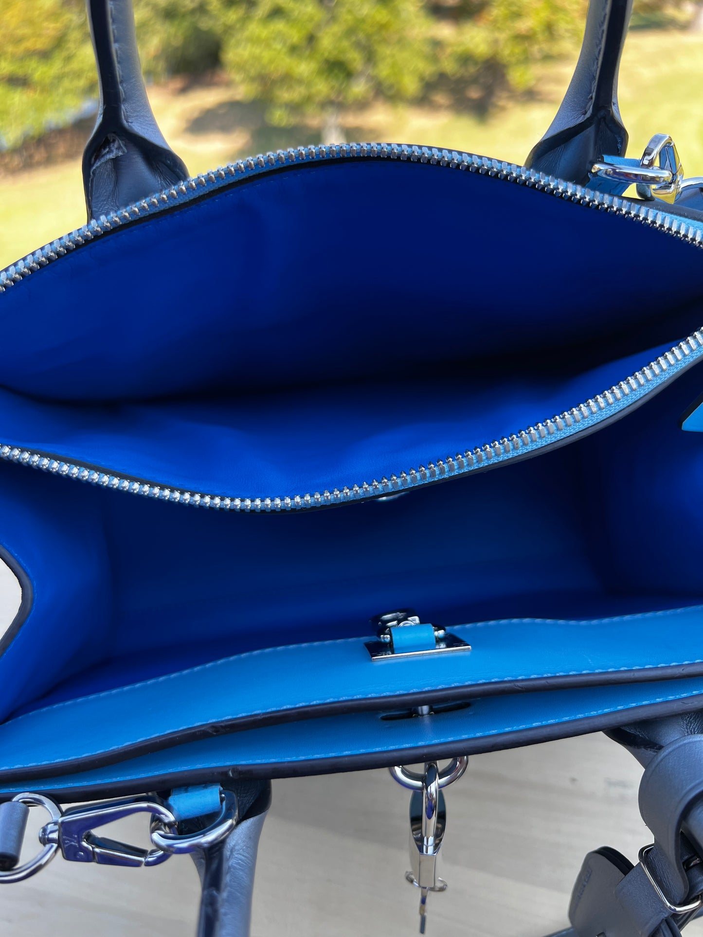 LOUIS VUITTON
Calfskin City Steamer PM Silver Blue