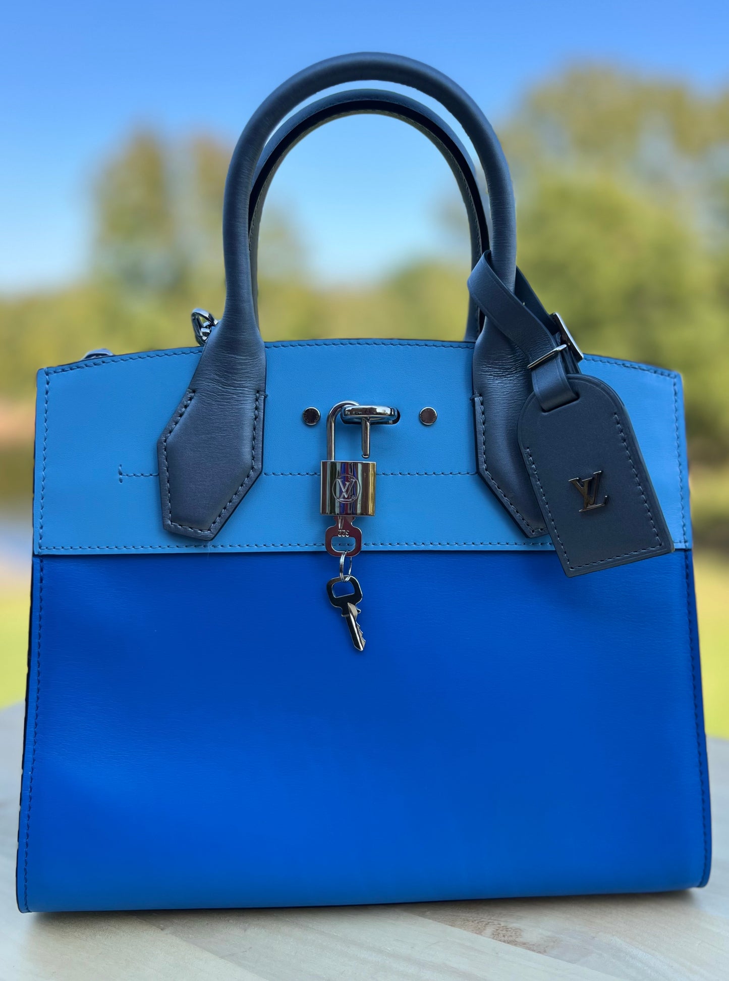 LOUIS VUITTON
Calfskin City Steamer PM Silver Blue