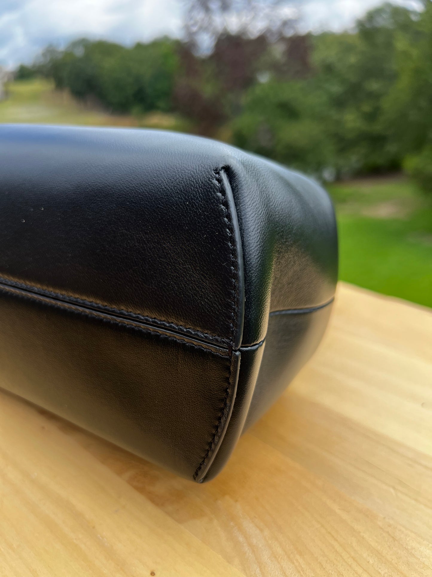 Fendi First Small Bag – Black Nappa Leather with Oversized F Clasp