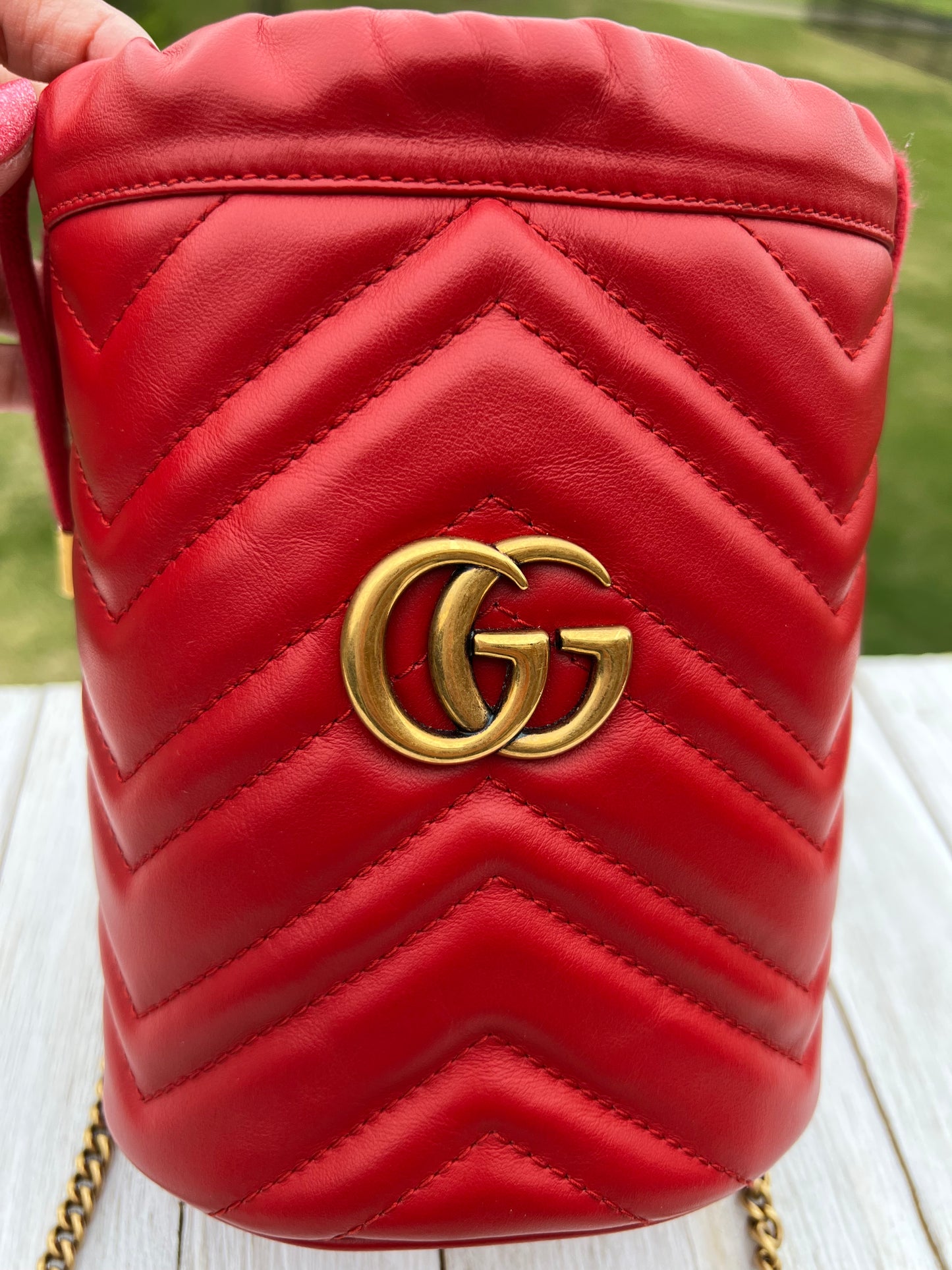 GUCCI
Calfskin Matelasse Mini GG Marmont 2.0 Bucket Bag Hibiscus Red