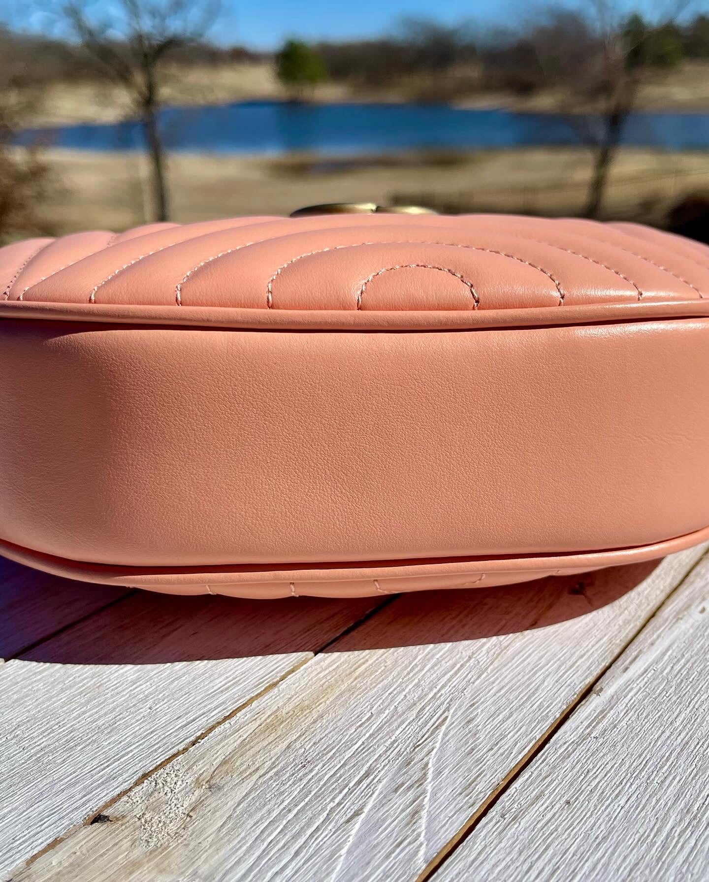 GUCCI
Calfskin Vertical Ring Matelasse Mini GG Marmont Half Moon Hobo Peachy Chic