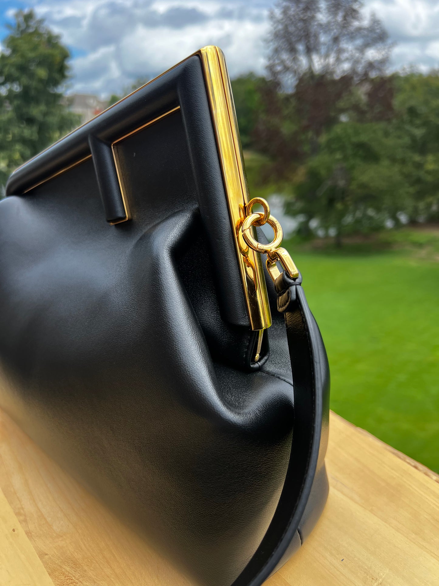 Fendi First Small Bag – Black Nappa Leather with Oversized F Clasp