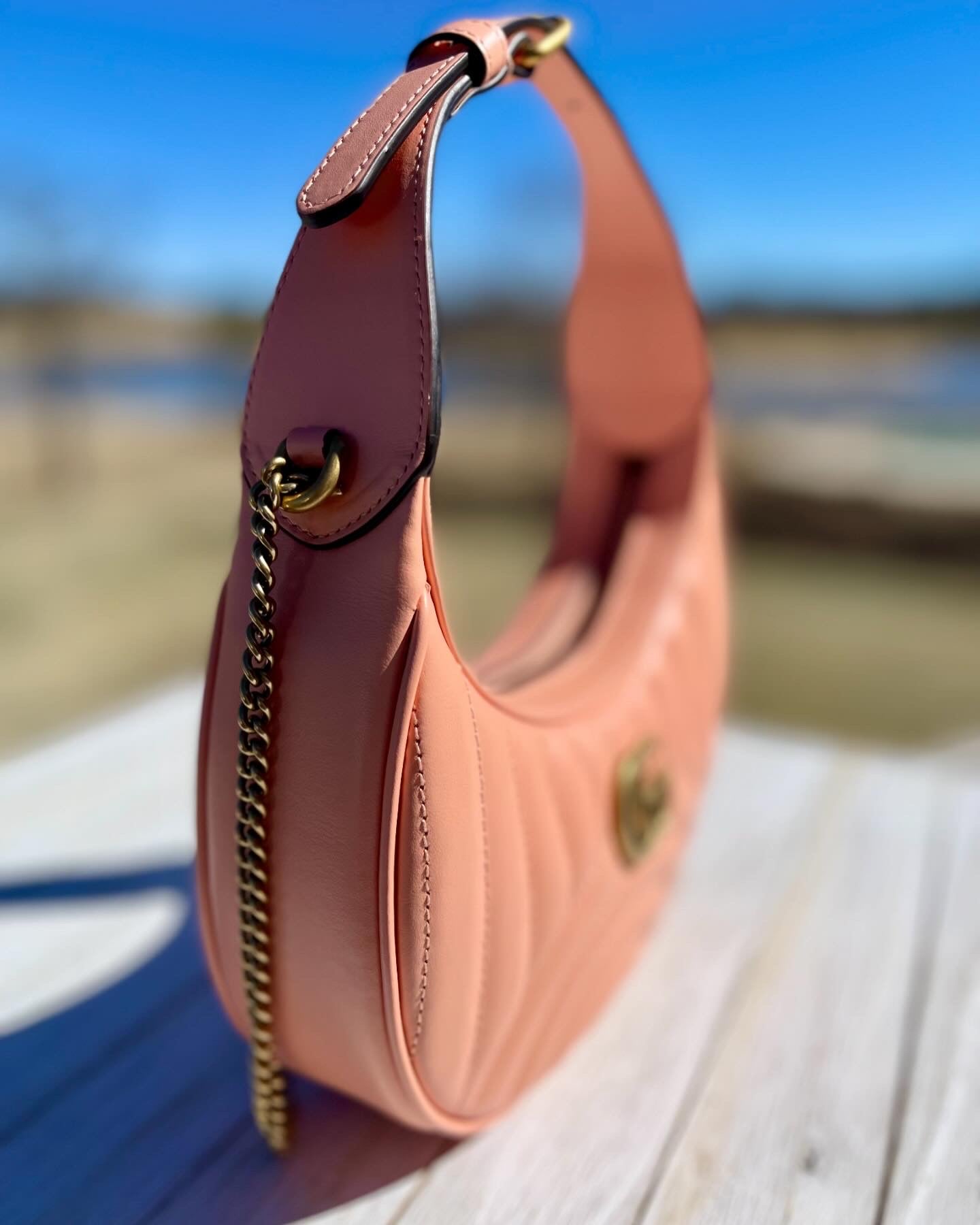 GUCCI
Calfskin Vertical Ring Matelasse Mini GG Marmont Half Moon Hobo Peachy Chic