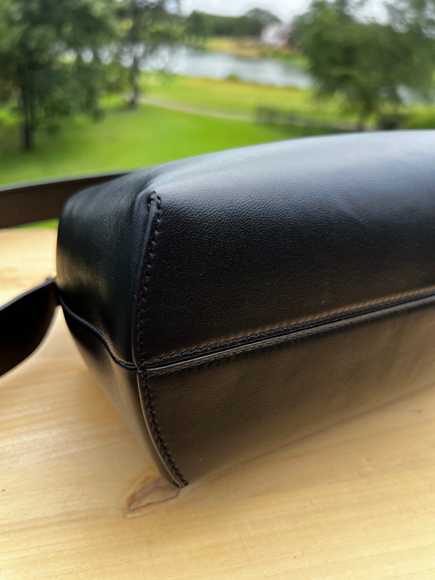Fendi First Small Bag – Black Nappa Leather with Oversized F Clasp