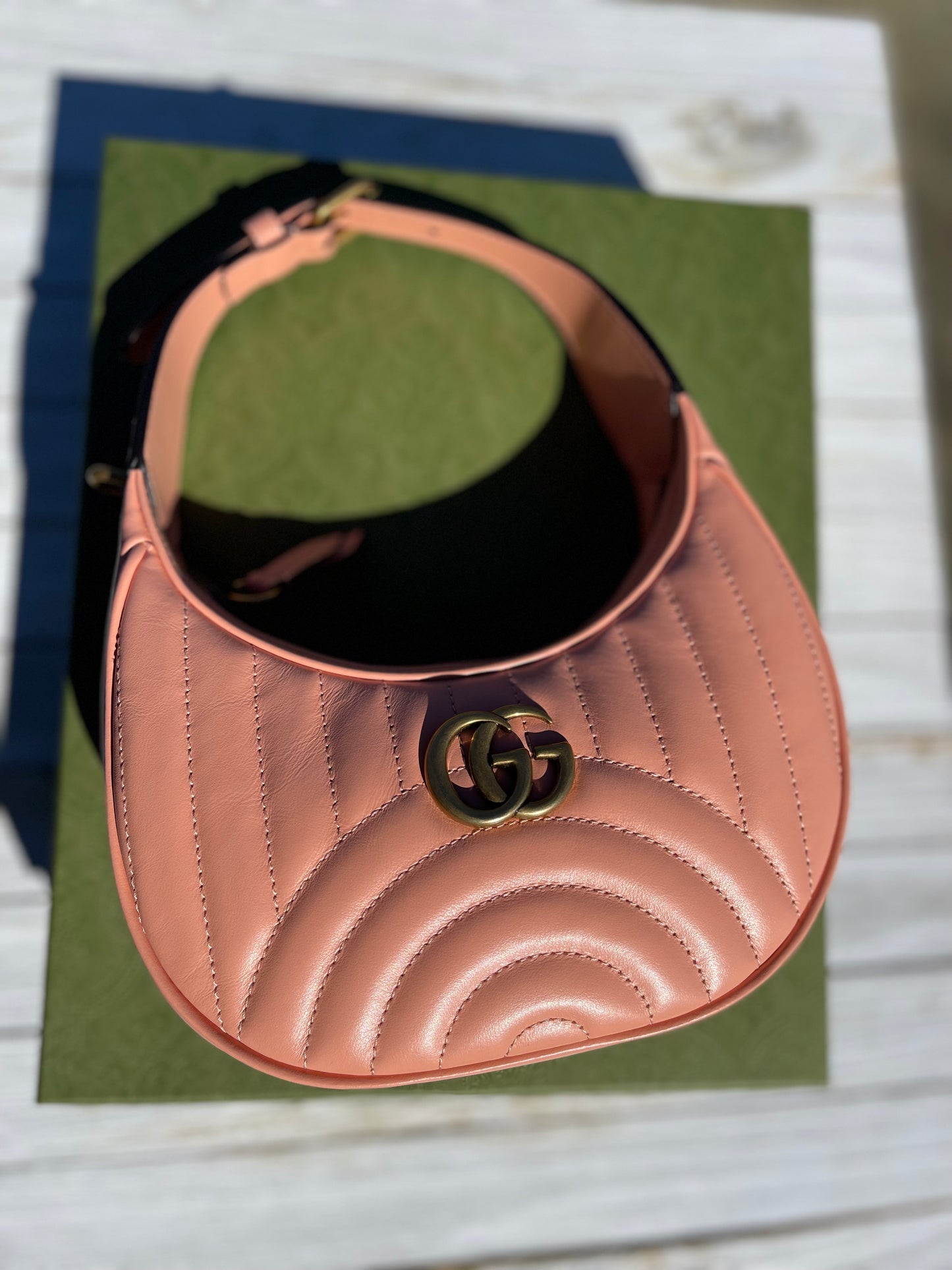 GUCCI 
Calfskin Vertical Ring Matelasse Mini GG Marmont Half Moon Hobo Peachy Chic