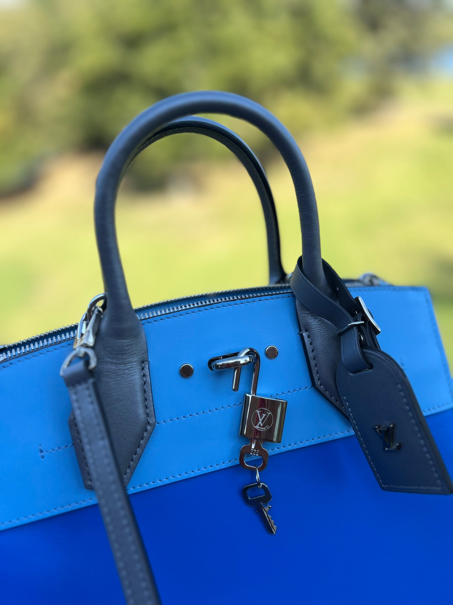 LOUIS VUITTON 
Calfskin City Steamer PM Silver Blue