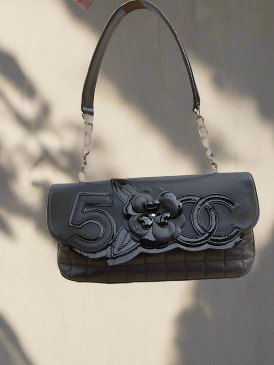 CHANEL
Black Quilted Lambskin Leather Camellia No. 5 Flap Shoulder Bag