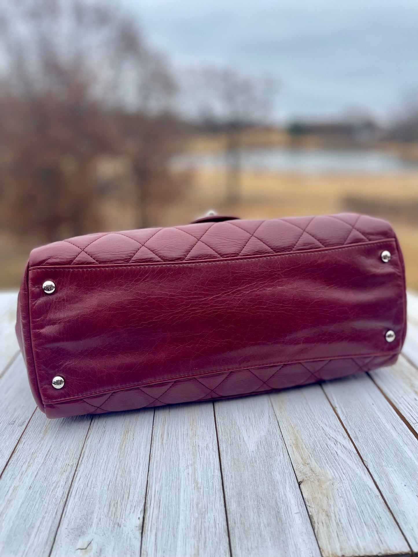 CHANEL 
Glazed Calfskin Quilted Small CC Delivery Tote Burgundy