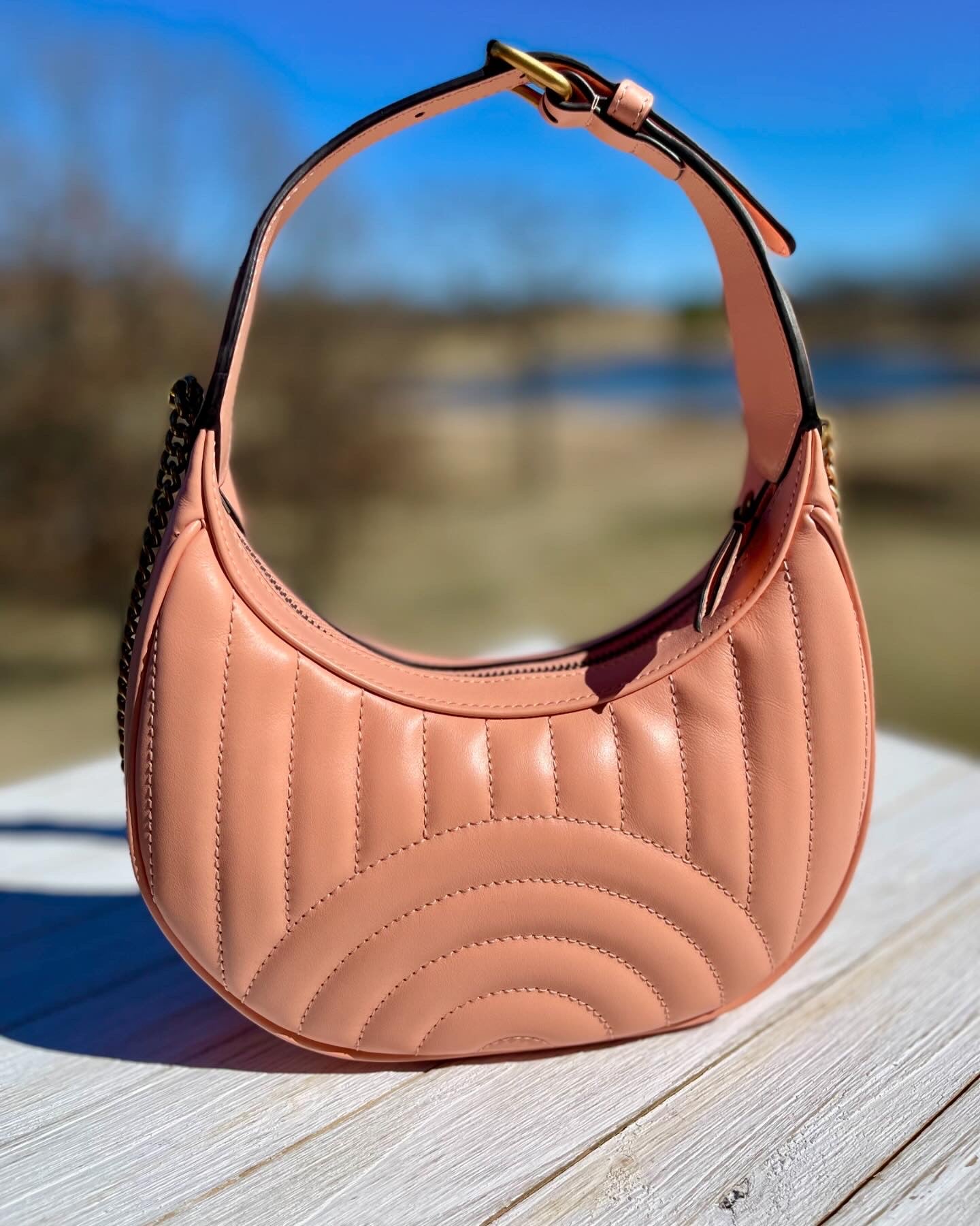 GUCCI 
Calfskin Vertical Ring Matelasse Mini GG Marmont Half Moon Hobo Peachy Chic