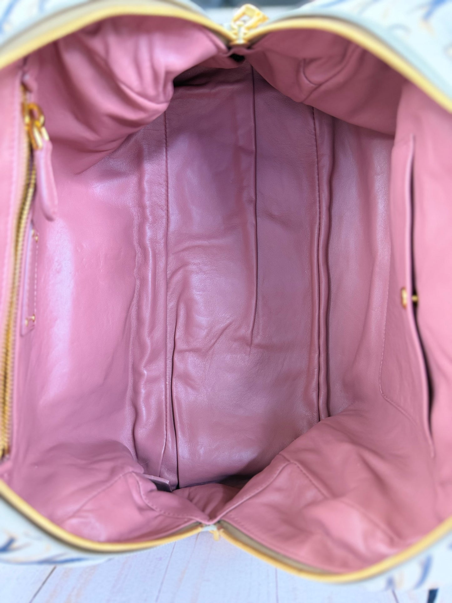 PRADA
X JAMES JEAN Cervo Lux Fairy Print Double Handle Leather Fairy Print Boston Bag