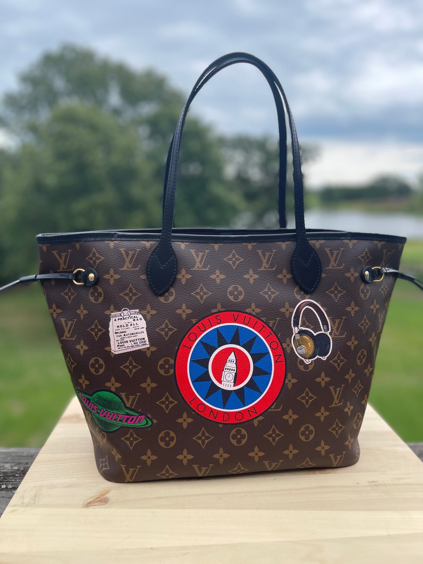 LOUIS VUITTON 
Monogram World Tour Neverfull MM