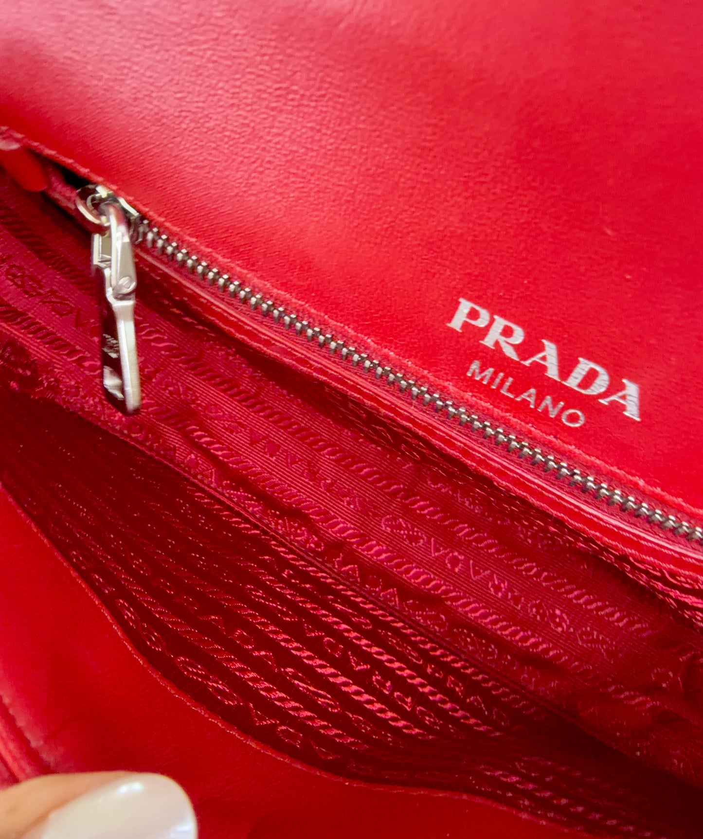 PRADA
Fuoco Nappa Gaufre Leather Chain Flap Bag