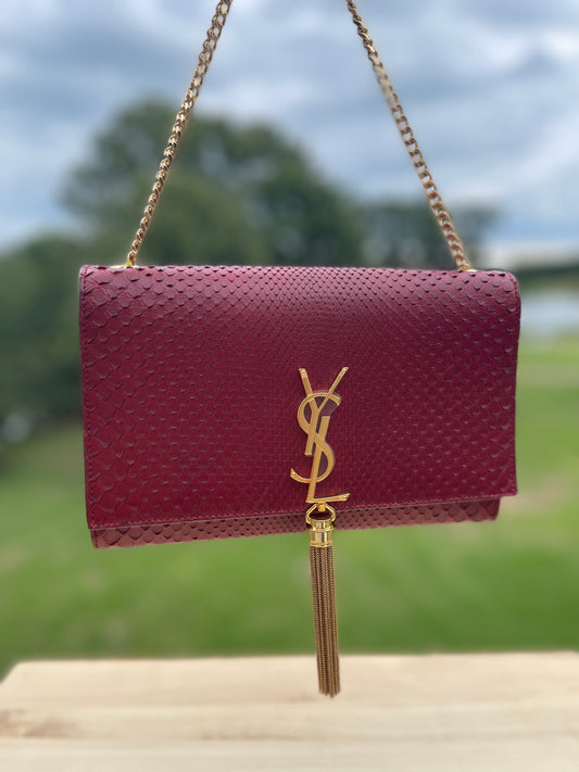 SAINT LAURENT 
Burgundy Snakeskin Embossed Kate Tassel Chain Medium Bag