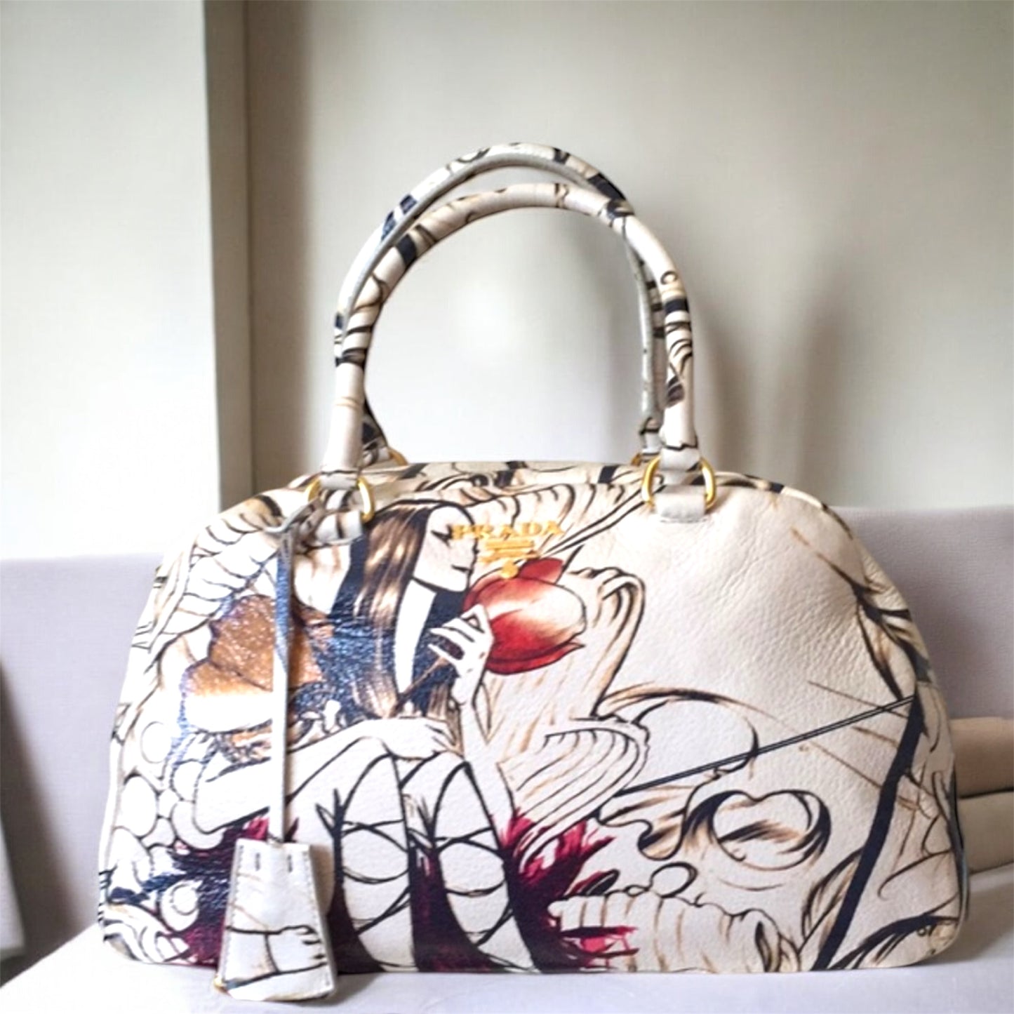 PRADA
X JAMES JEAN Cervo Lux Fairy Print Double Handle Leather Fairy Print Boston Bag